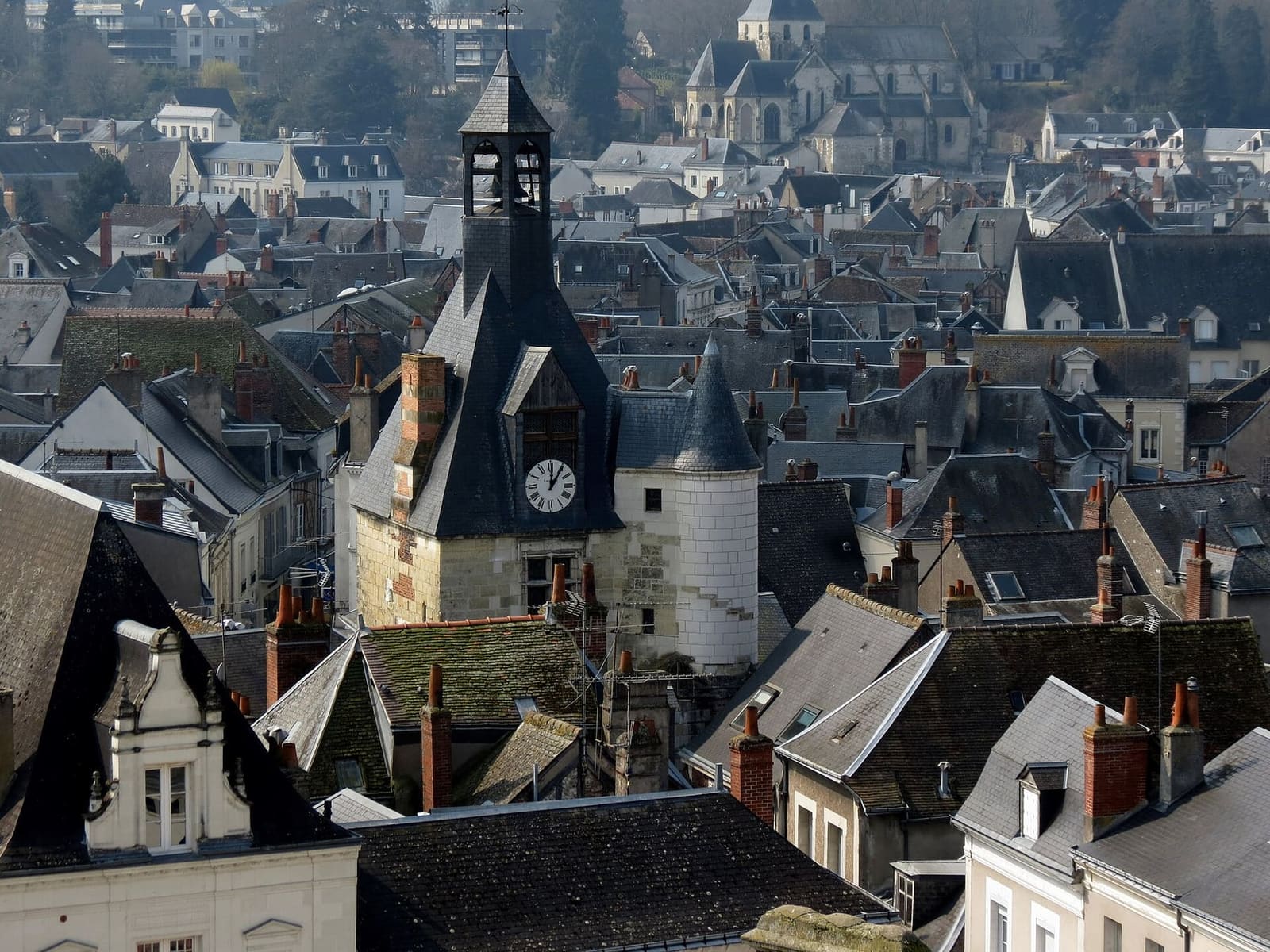 the Tour de l'Horloge among the slate roofs, seen from above