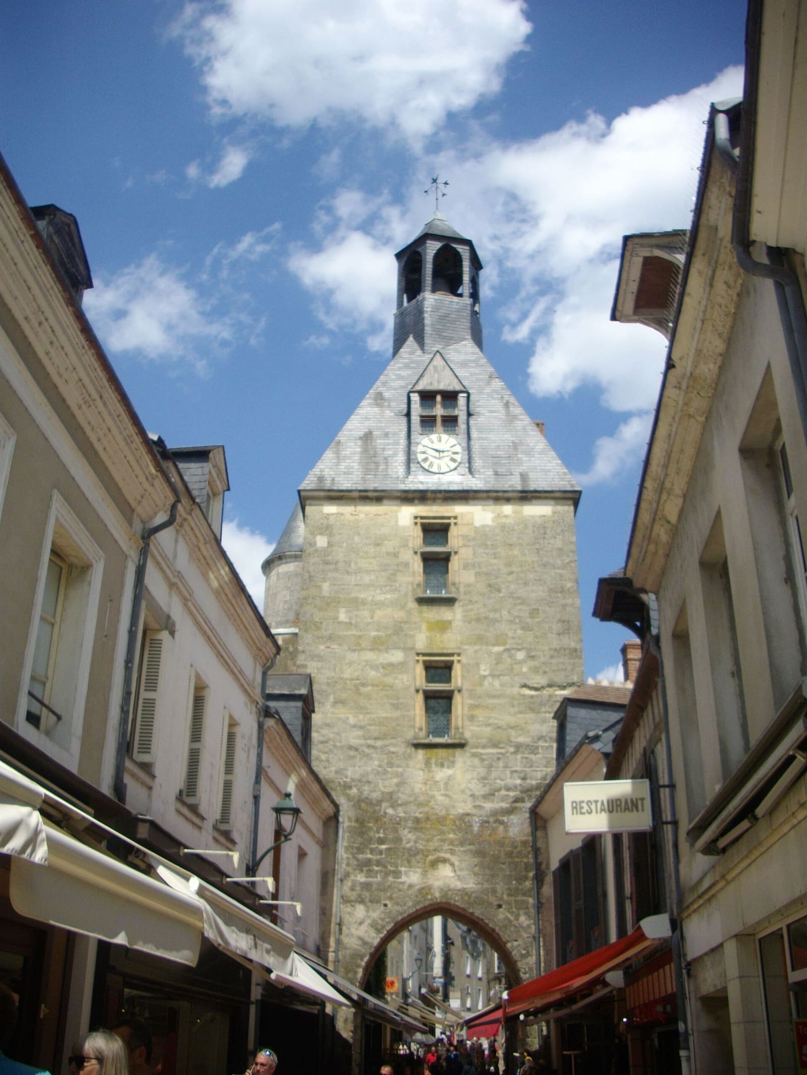 the Tour de l'Horloge at the end of the shopping street