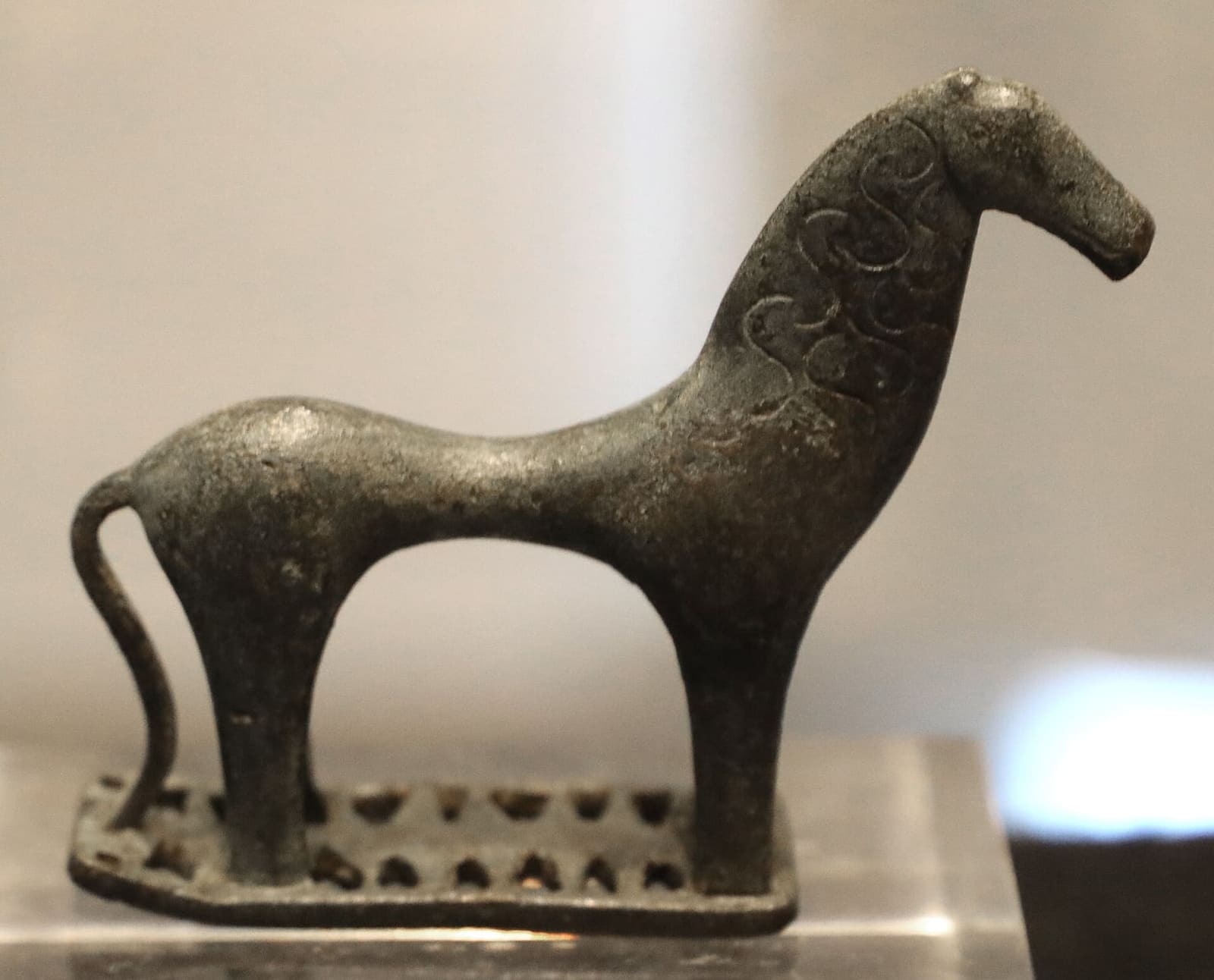 a small bronze horse in the Geometric style, offered to the goddess around 650 BC