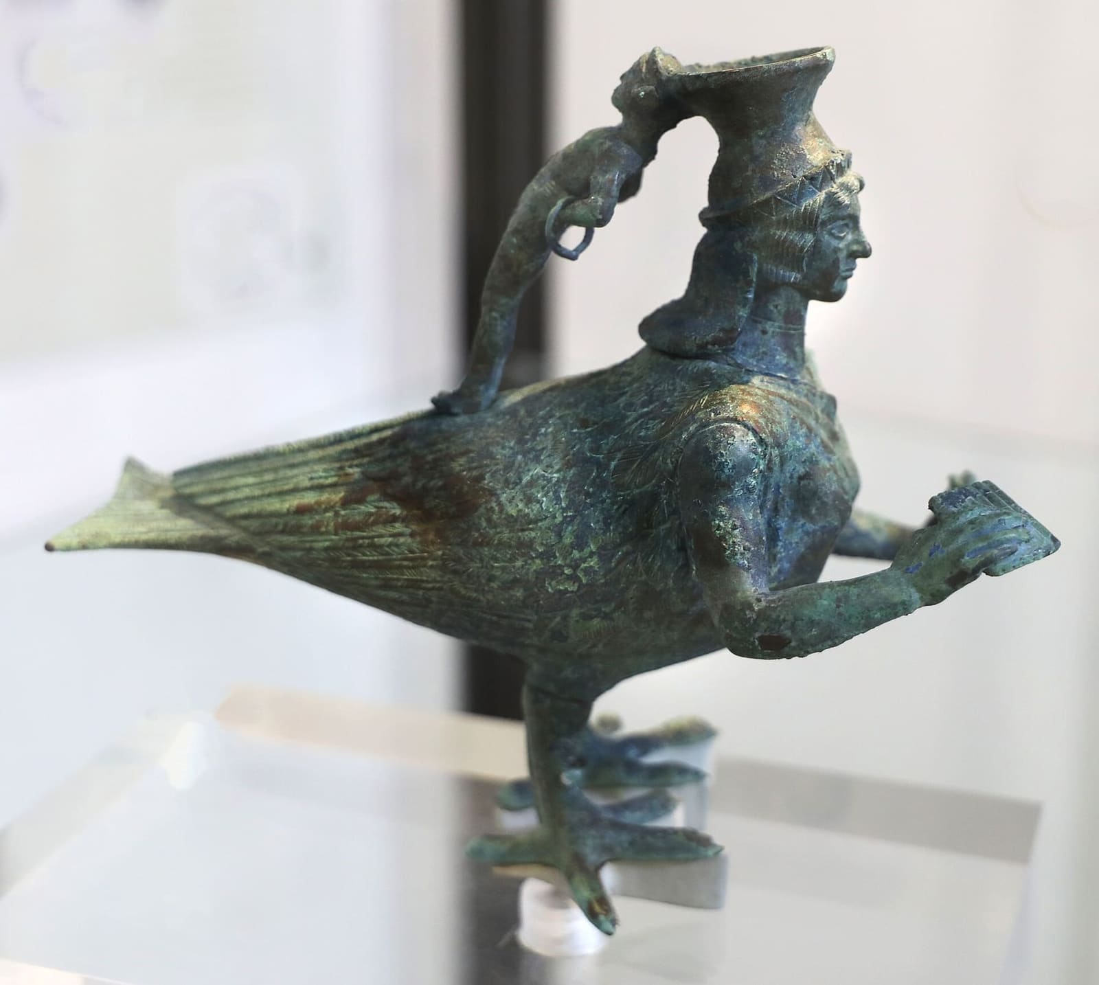 the siren-shaped bronze askos returned by the Getty Museum