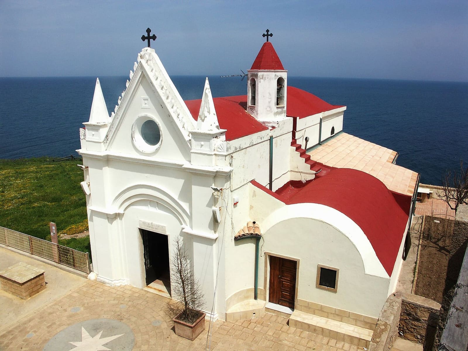 the white church of the Madonna di Capo Colonna, on the churchyard