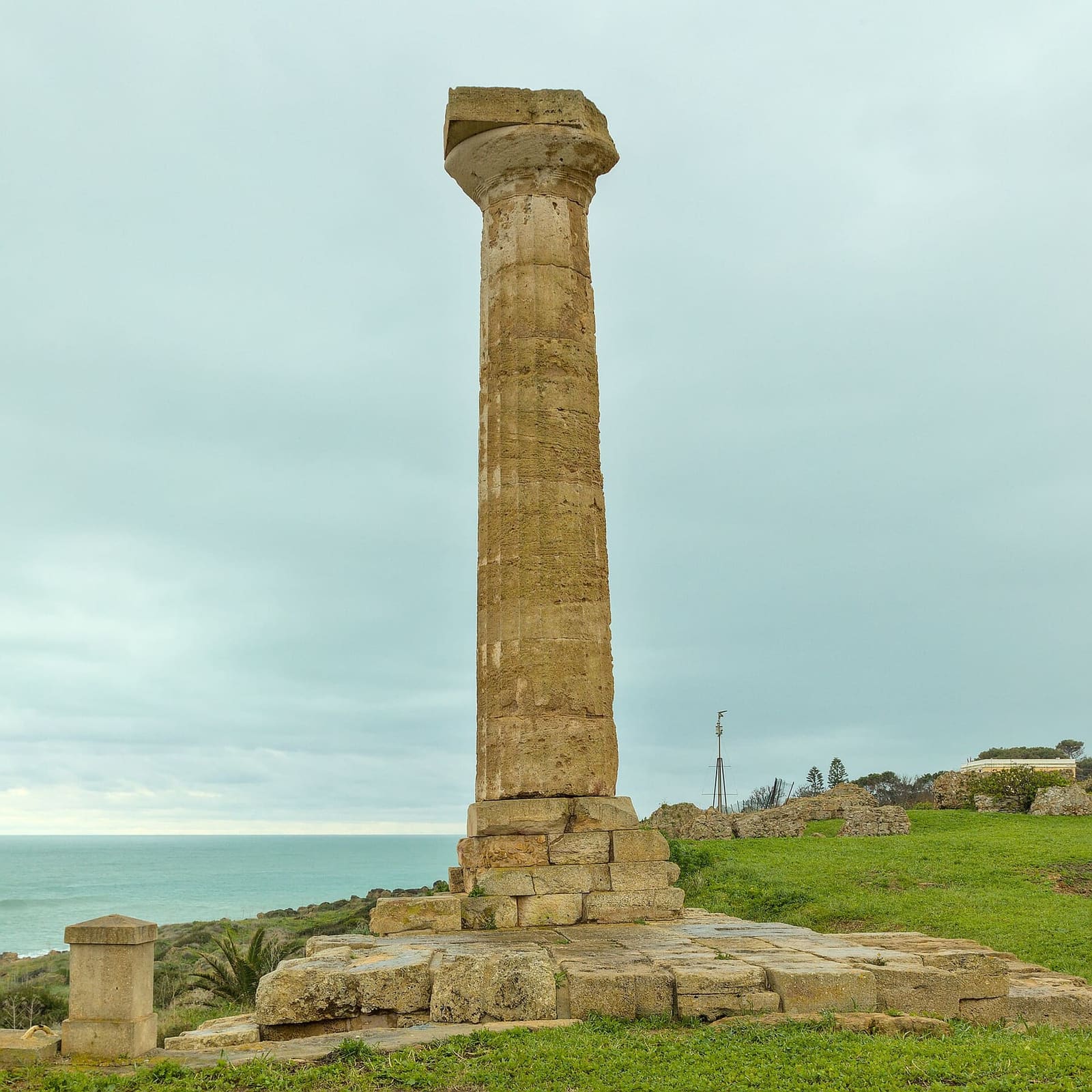 the surviving column of the temple, on the edge of the promontory