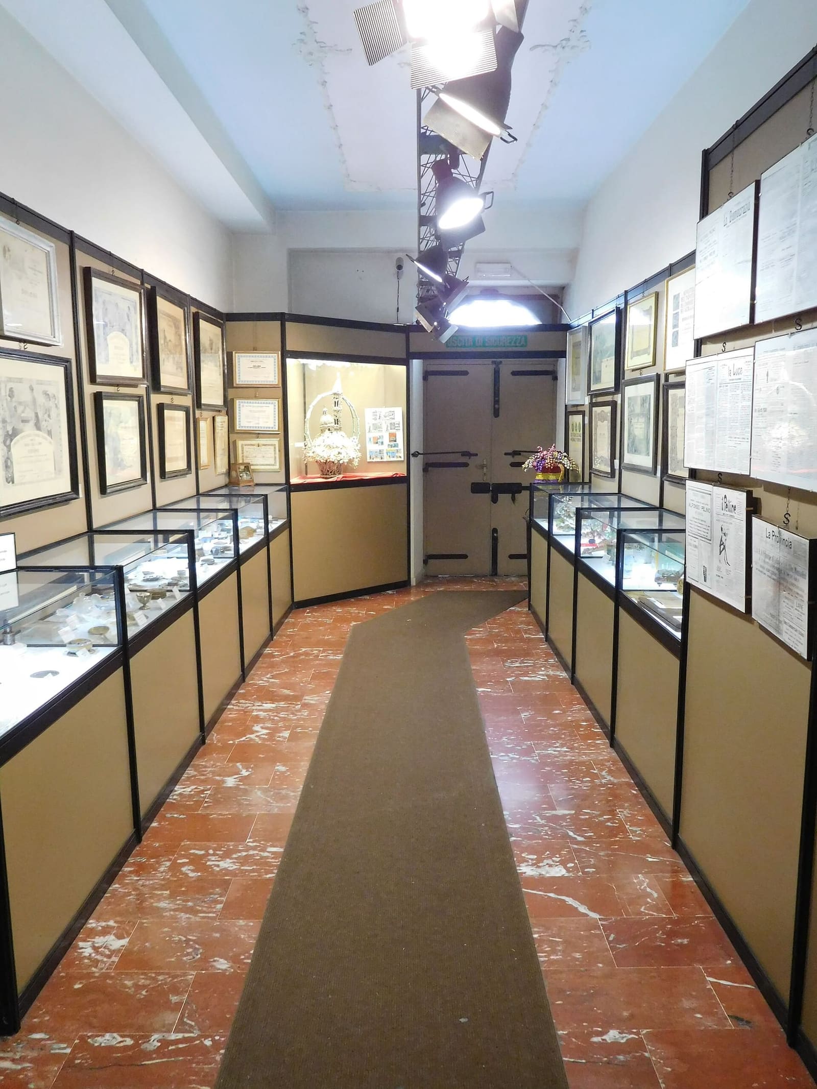 the room of the Pelino museum with the diplomas, the prizes and the patents on the walls