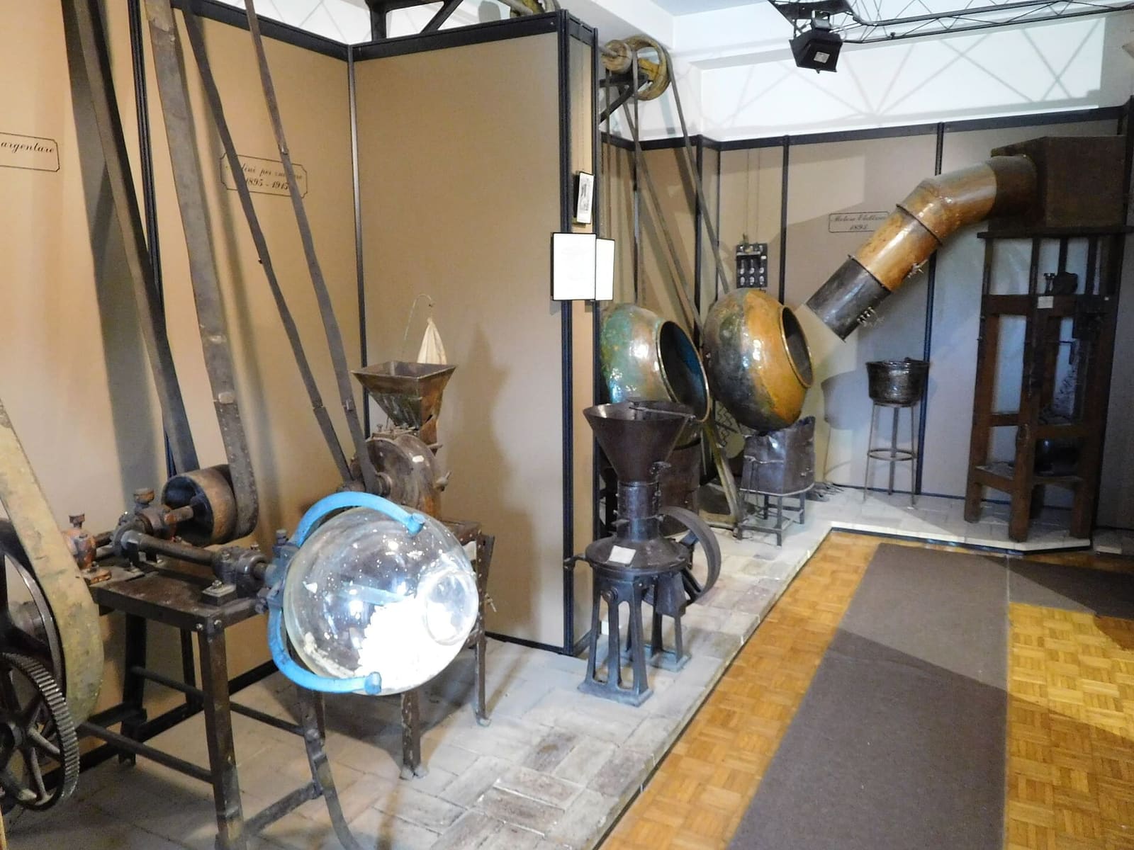 the rotating copper pans and the mills in the machine room of the Pelino museum