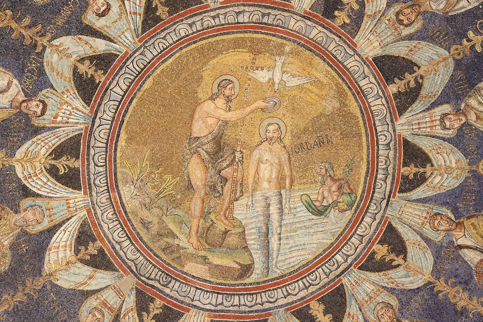 the baptism of Christ in the Jordan with John the Baptist, in the medallion at the centre of the dome of the Neonian Baptistery
