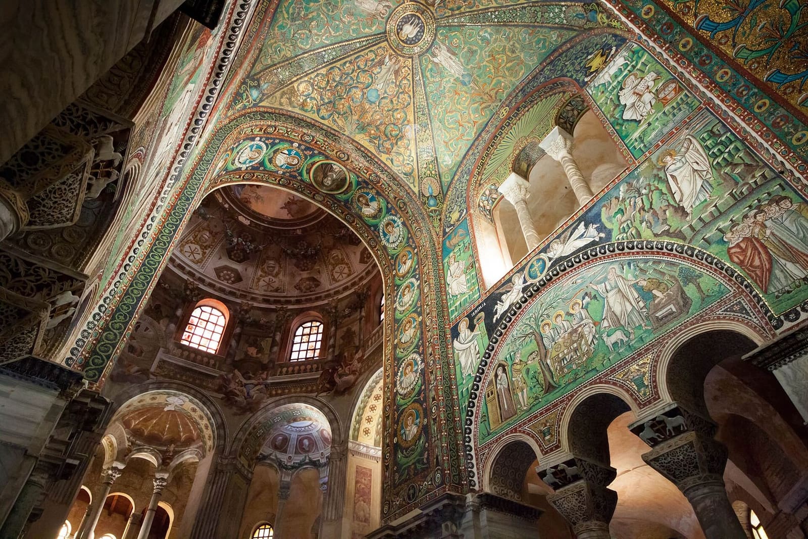 the mosaics of the presbytery of San Vitale seen from below, with the dome in the background