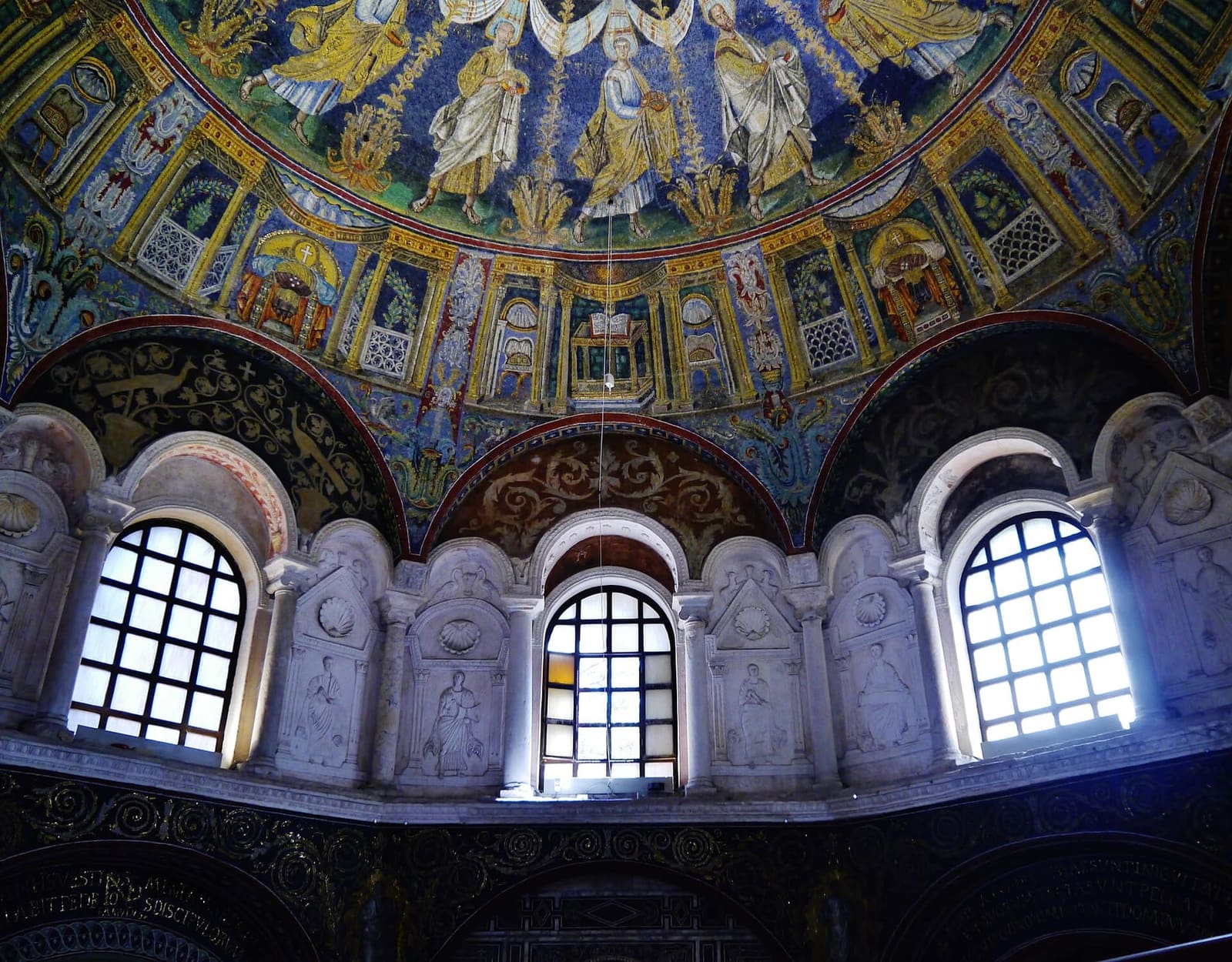 the dome of the Neonian Baptistery with the procession of the apostles above the windows