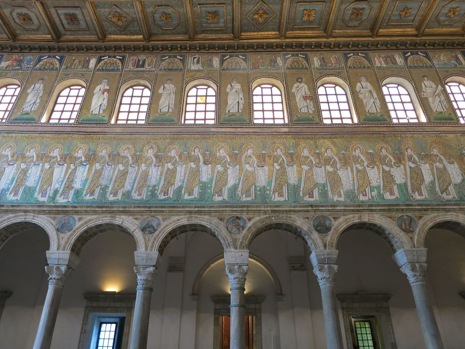 the procession of the virgins on the left wall of the nave of Sant'Apollinare Nuovo
