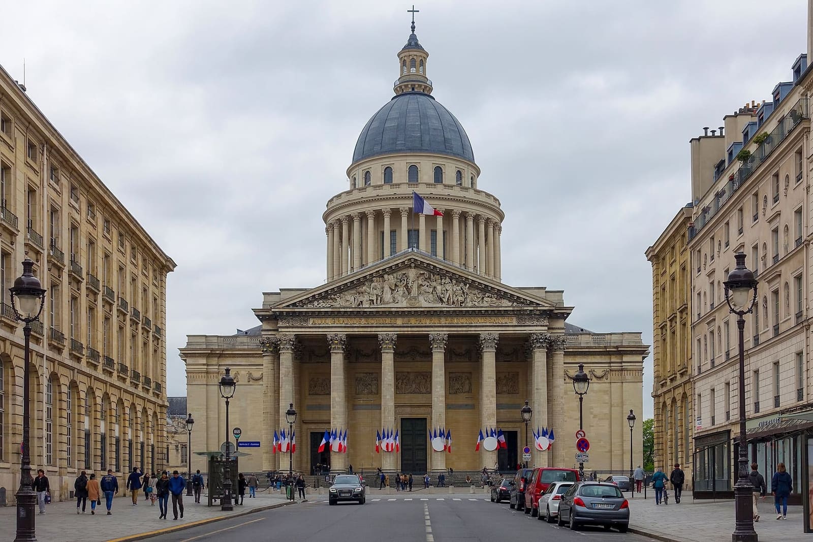 the Panthéon at the end of Rue Soufflot, with its dome and flags in front of the columns