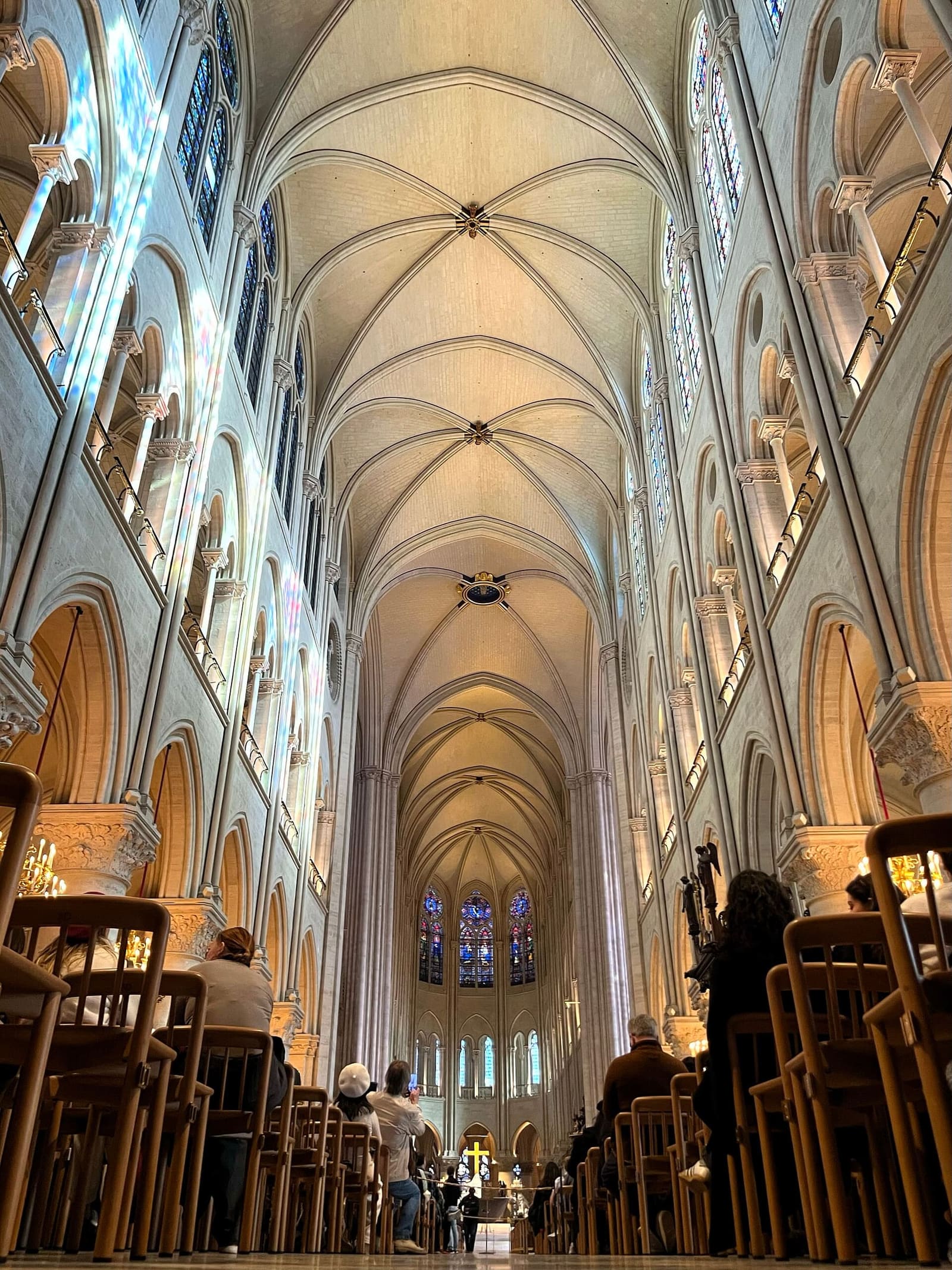 the nave of Notre-Dame after the restoration, with the pale vaults and the apse windows at the end