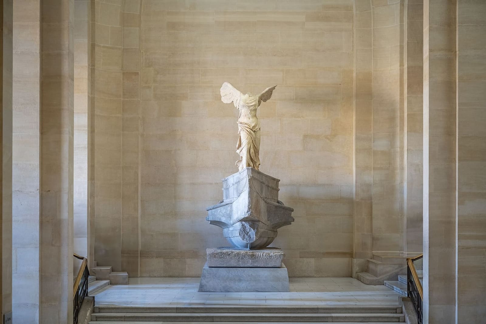 the Winged Victory of Samothrace at the top of the Daru staircase in the Louvre