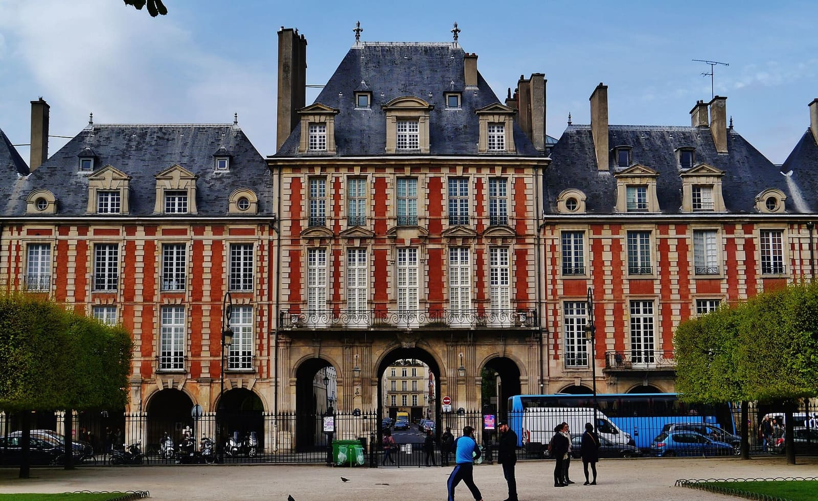 one of the taller pavilions of Place des Vosges, with the arched passage below